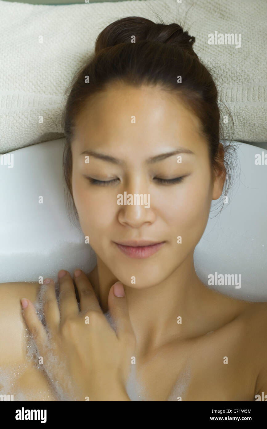 Young woman taking bubble bath Stock Photo Alamy