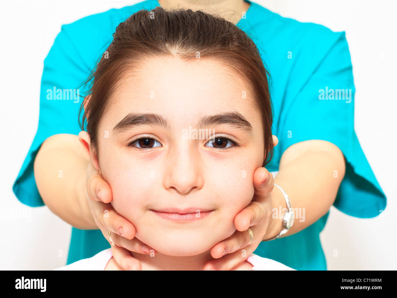 Physiotherapy for children with cervical problems Stock Photo