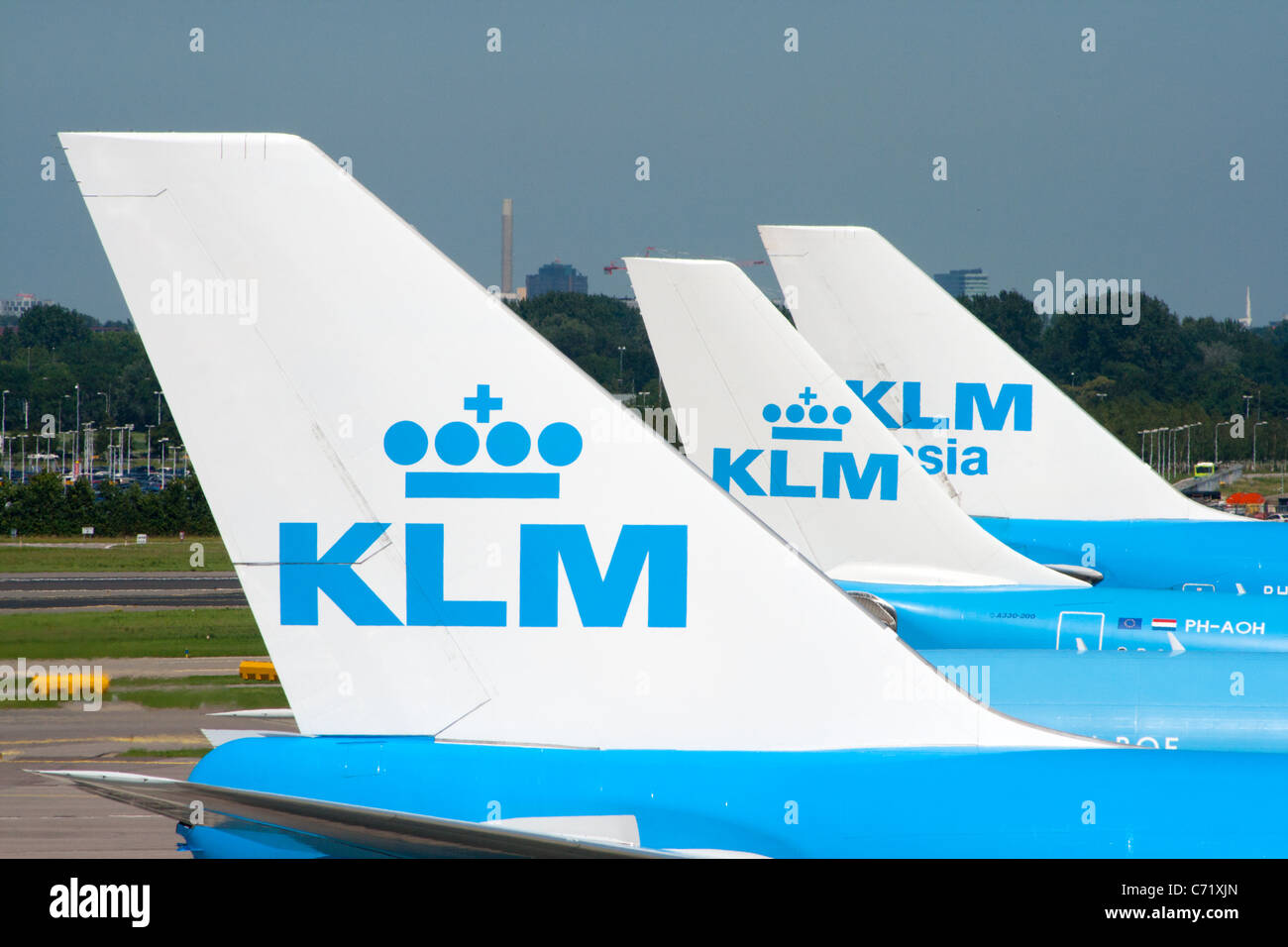 Row of planes seen fromt he viewing deck at Amsterdam-Schiphol airport in Holland Stock Photo