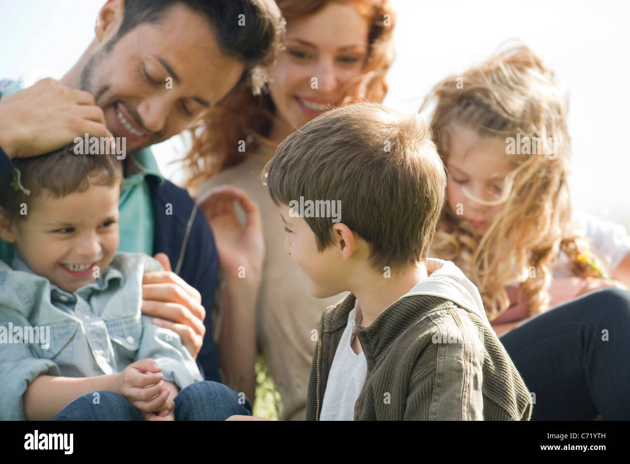 Family spending time together outdoors Stock Photo