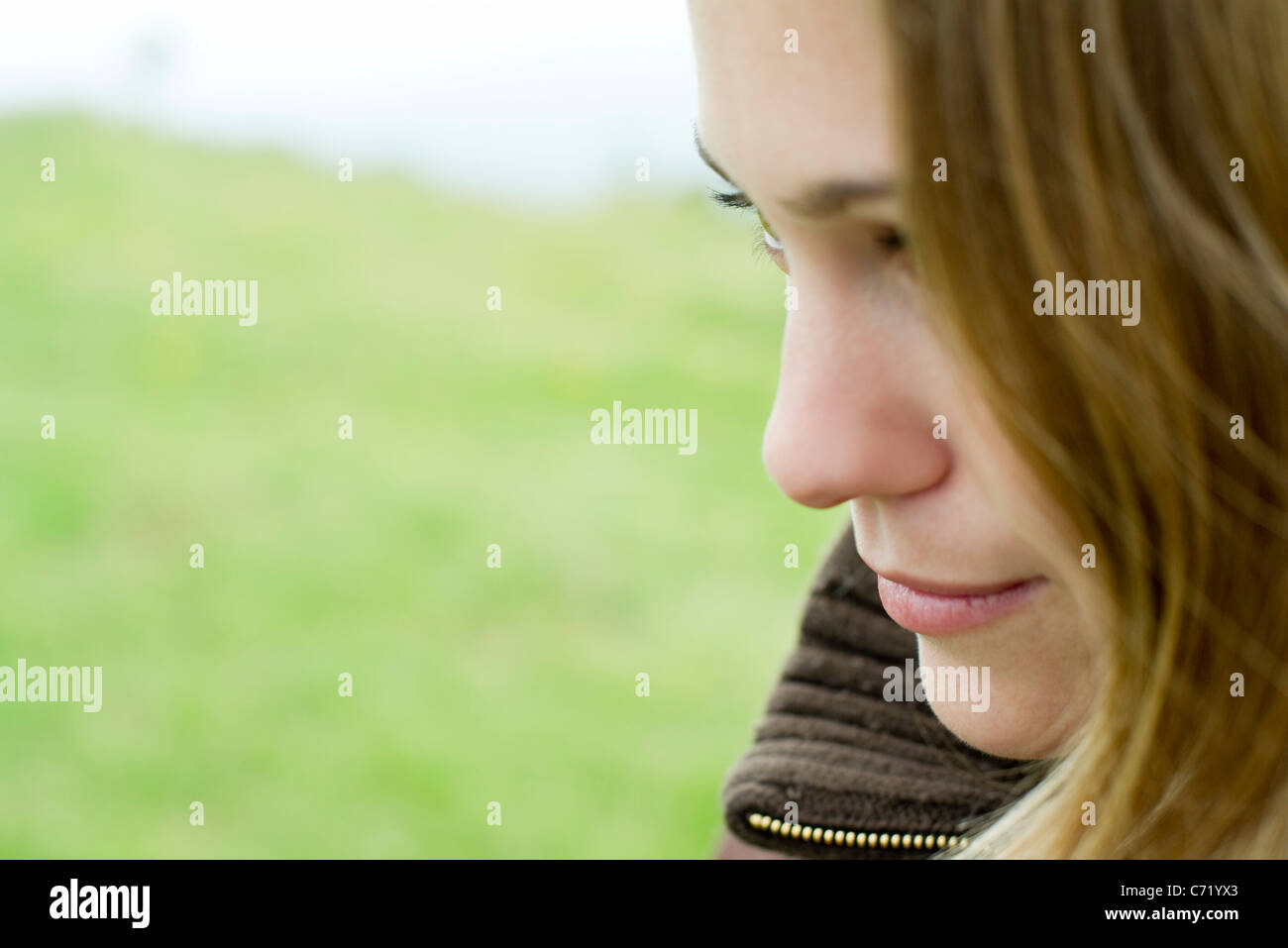 Young woman, side view Stock Photo