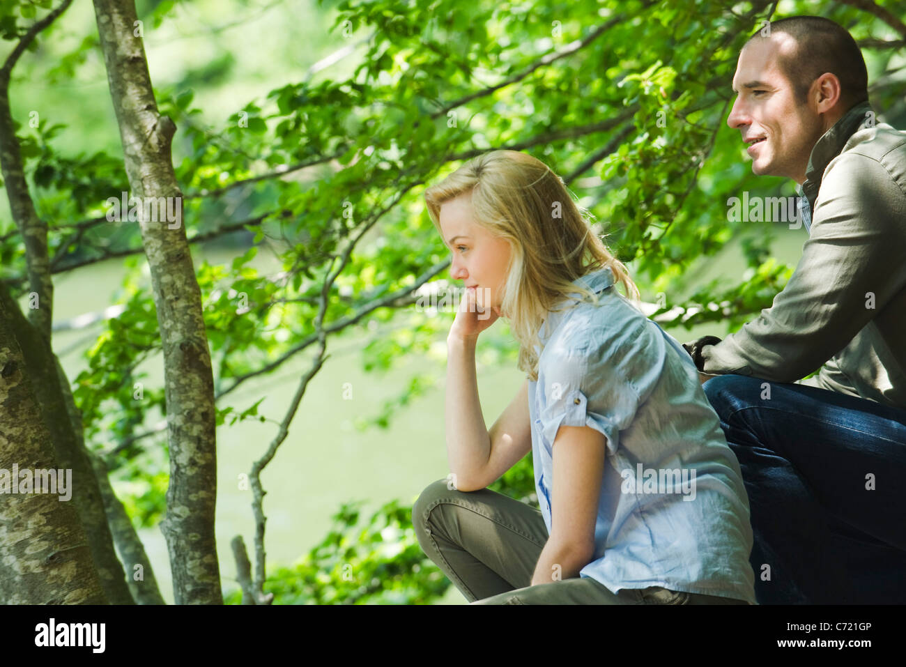 Couple looking at view in nature Stock Photo