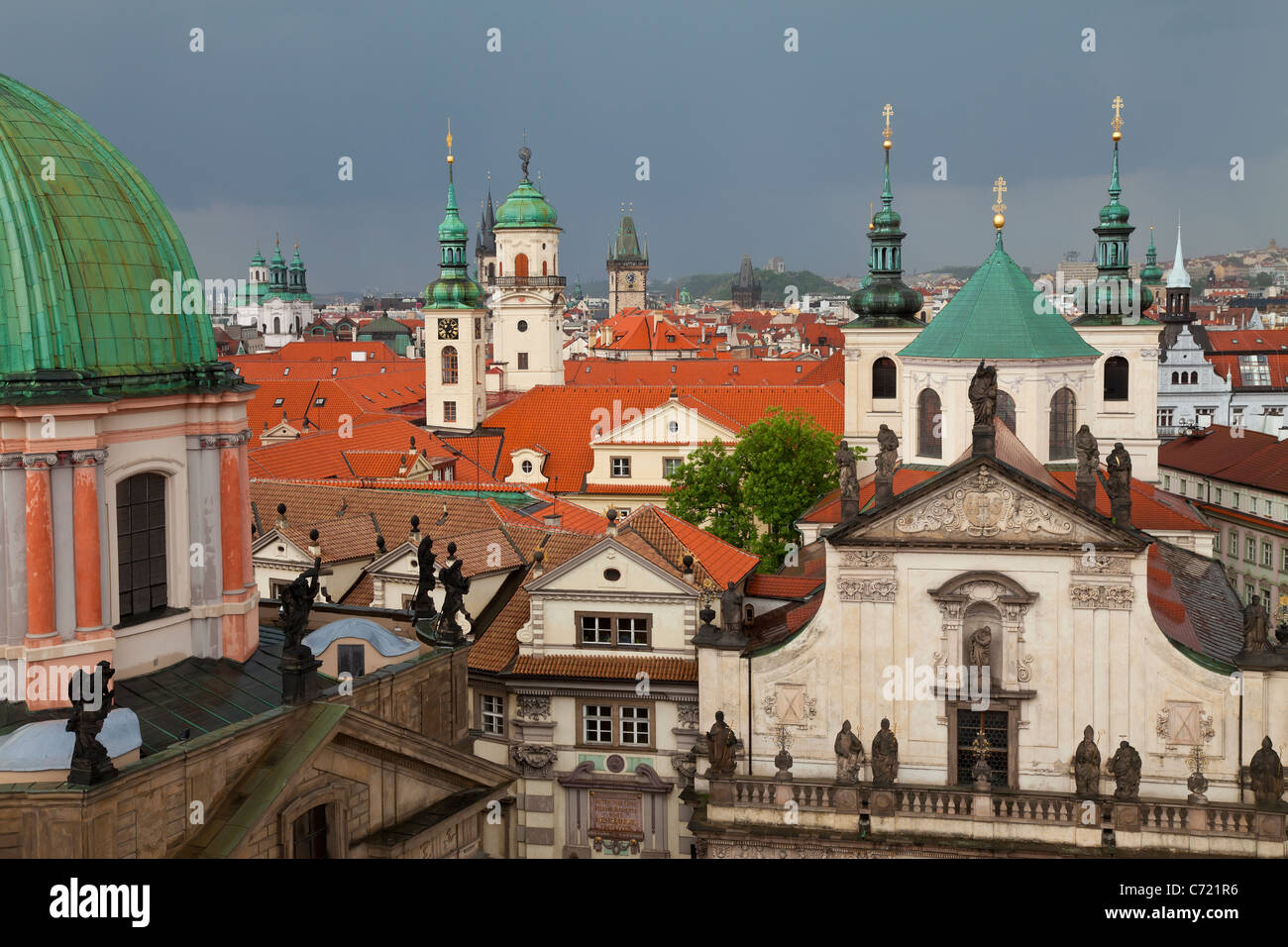 Church towers and rooftops of the Prague skyline in Prague, Czech Republic Stock Photo