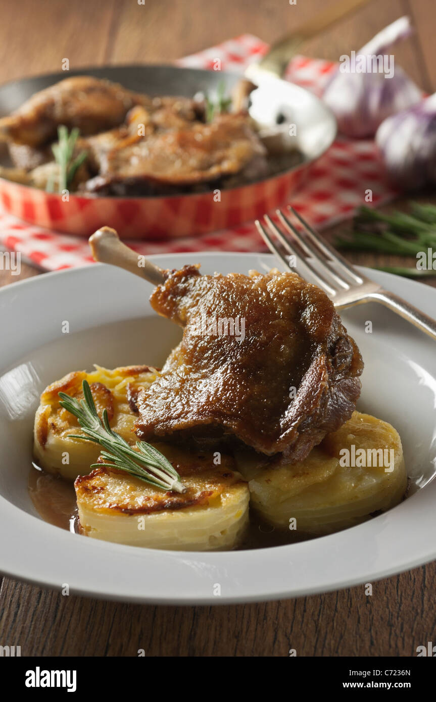 Confit of duck with dauphinoise potatoes Stock Photo Alamy