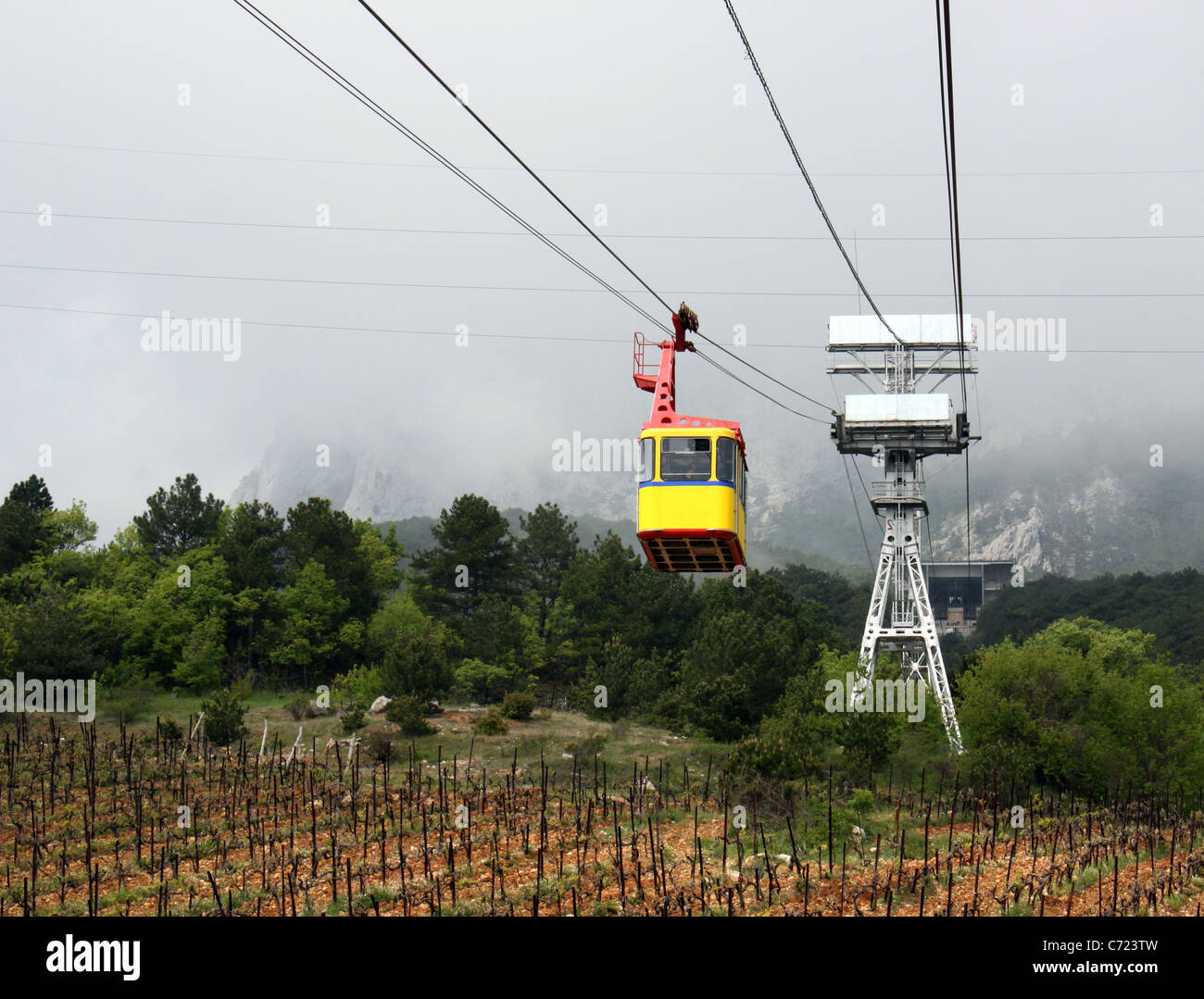 aerial ropeway cabin going from mountain Stock Photo