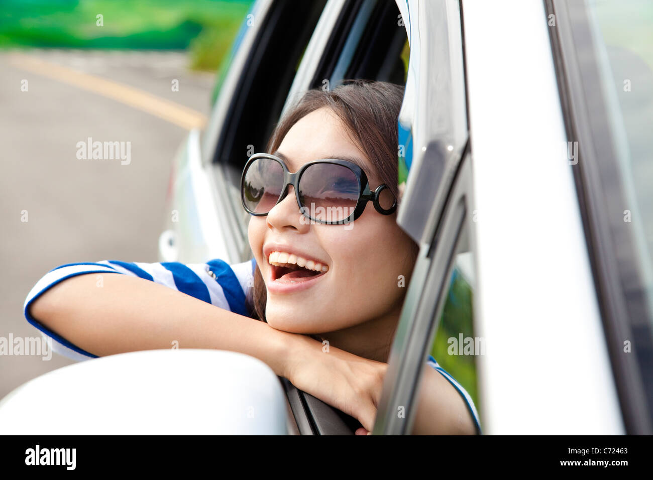 beautiful Woman Sitting In the Car Stock Photo