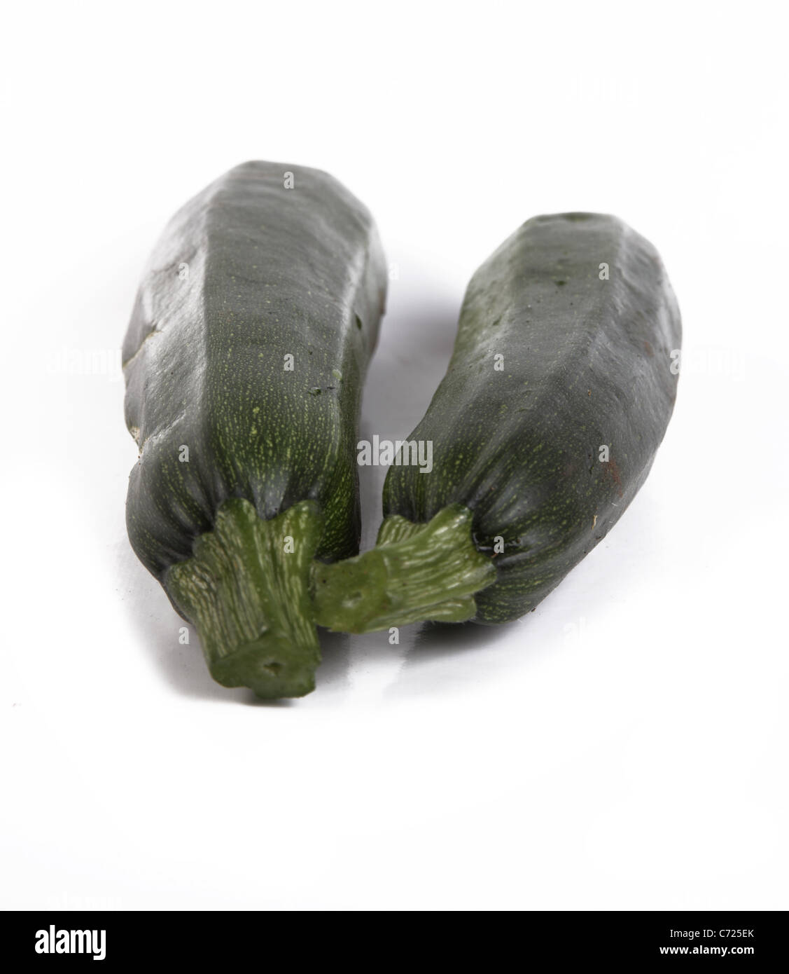 Allotment Grown Courgettes on White Background Stock Photo