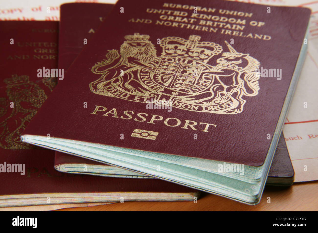 UK Passports; Forgeries and Illegal Immigration concept Stock Photo