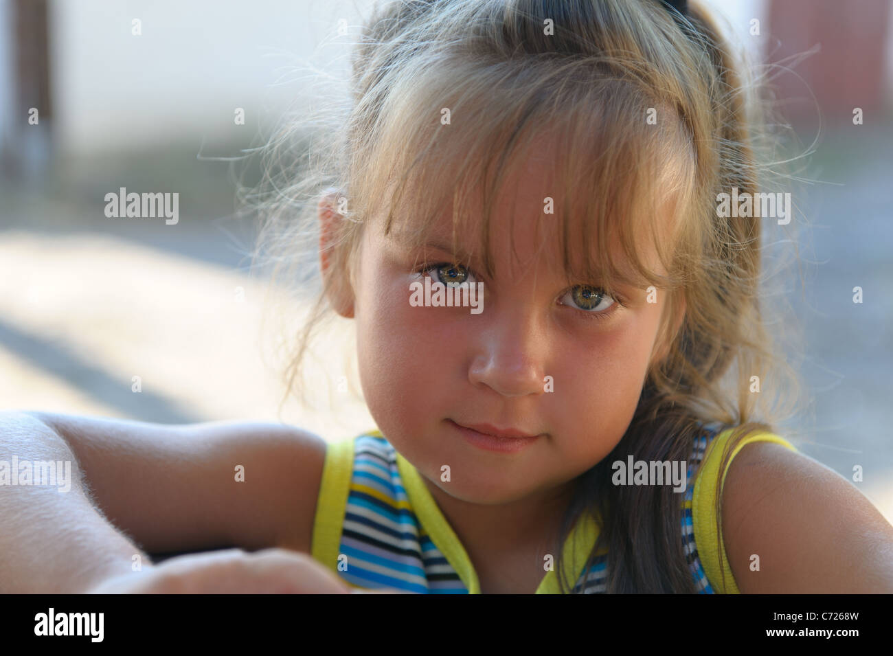 Portrait of the little girl close up. Outdoors Stock Photo - Alamy