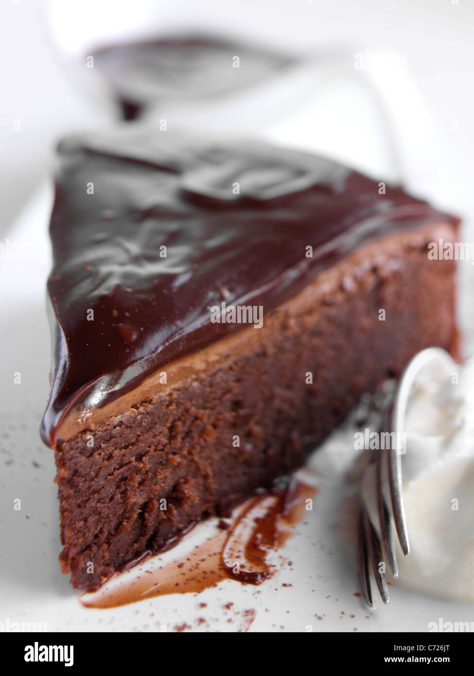 Chocolate fudge cake slice Stock Photo Alamy