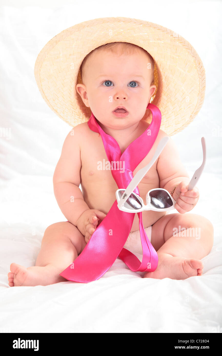 cute baby wearing hat tie and sunglasses Stock Photo Alamy