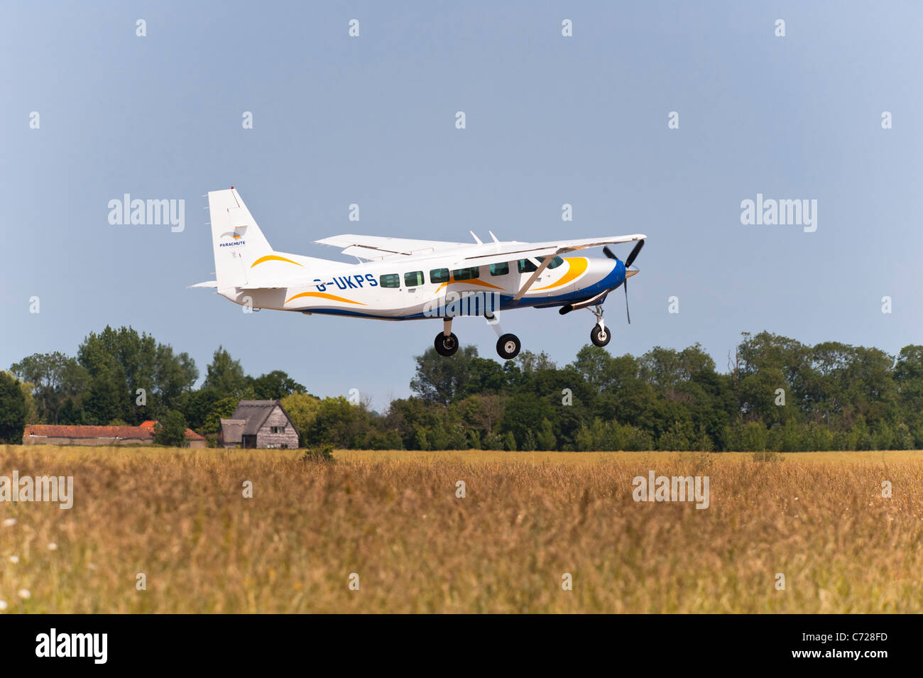 A light aircraft at UK Parachute Services Limited takes off at Ellough