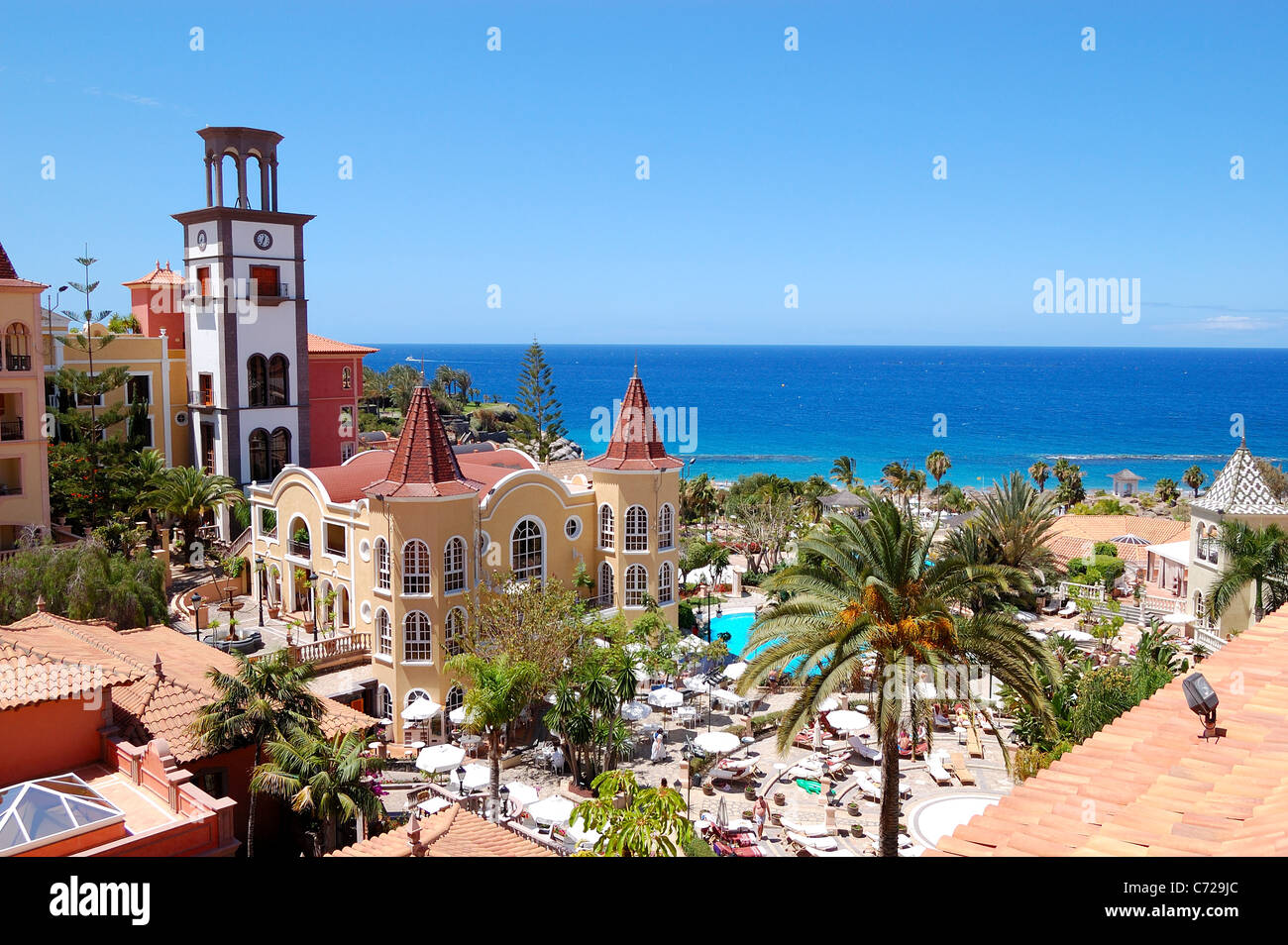 Tower with clock at the luxury hotel, Tenerife island, Spain Stock Photo