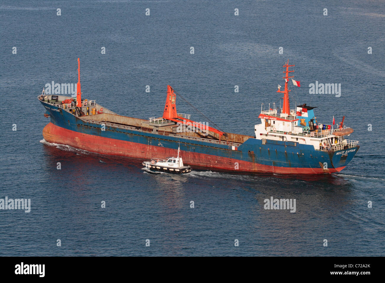 Sea transport. The cargo ship MV Mecit Kaptan under way with open holds Stock Photo