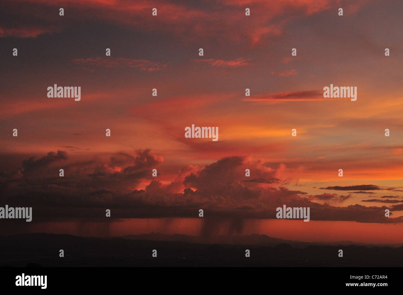 A monsoon shower at sunset seen from Windy Point, Mount Lemmon, Coronado National Forest