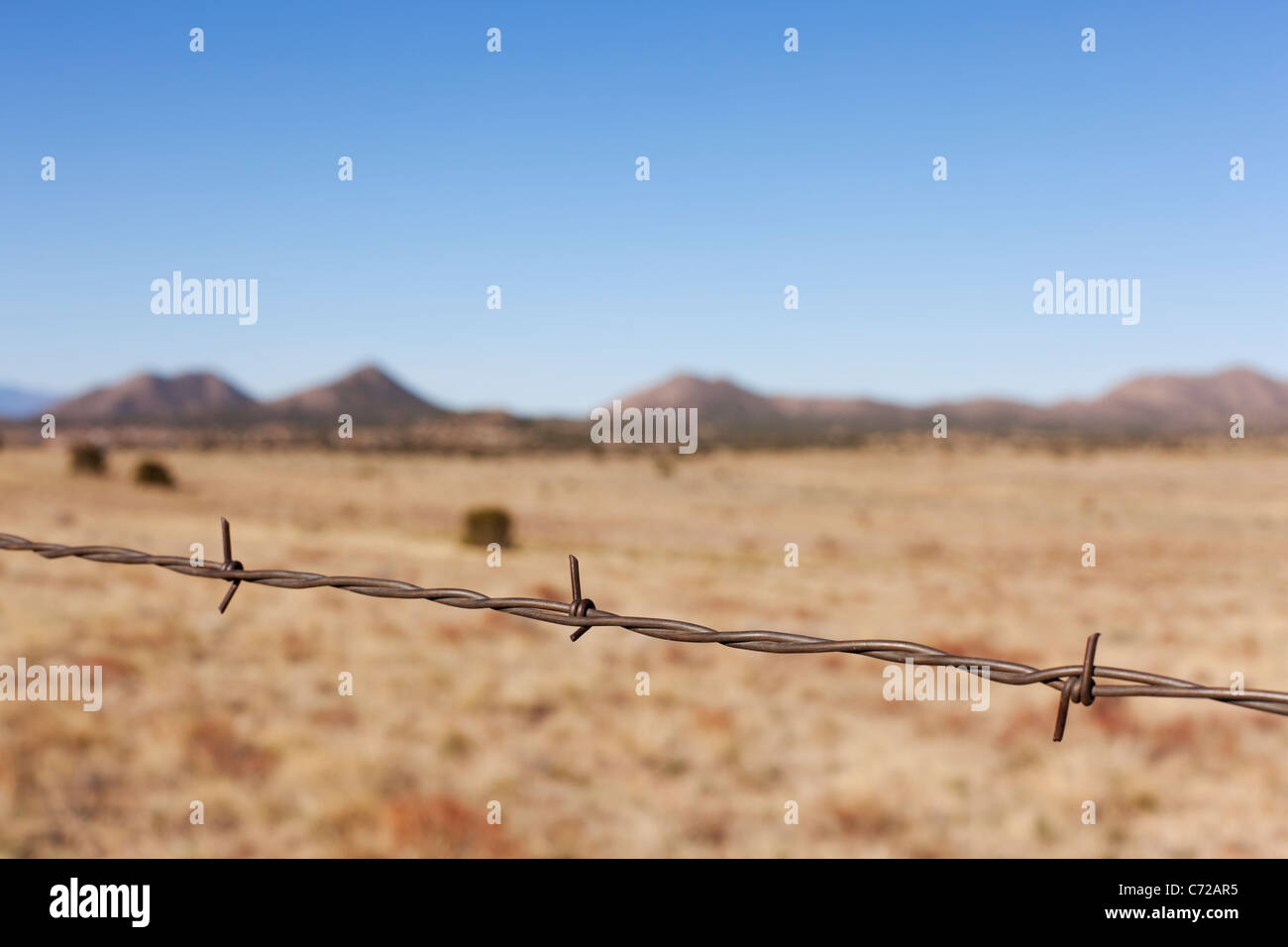 Barbed wire in rural New Mexico. Stock Photo