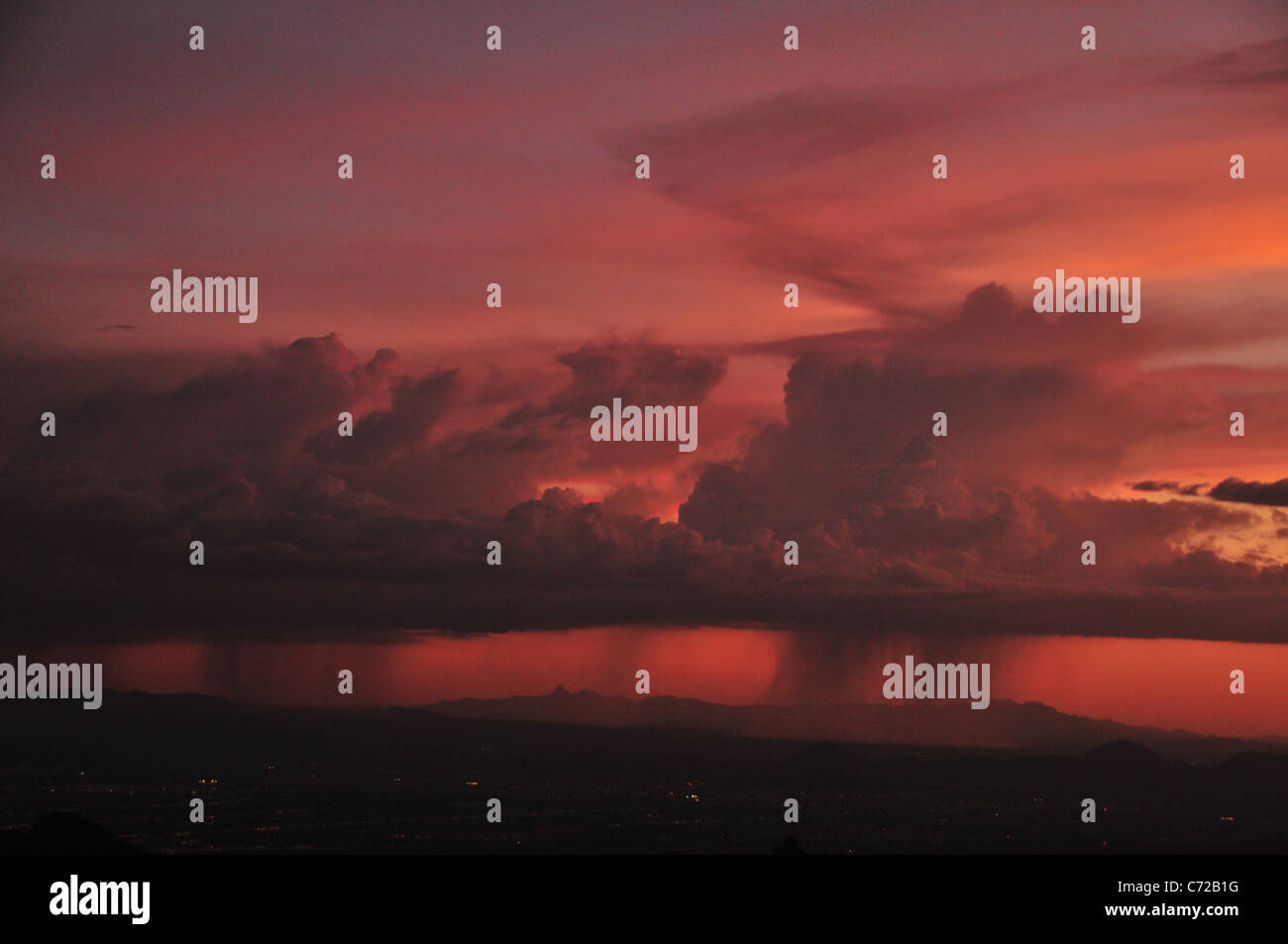 A monsoon shower at sunset seen from Windy Point, Mount Lemmon, Coronado National Forest