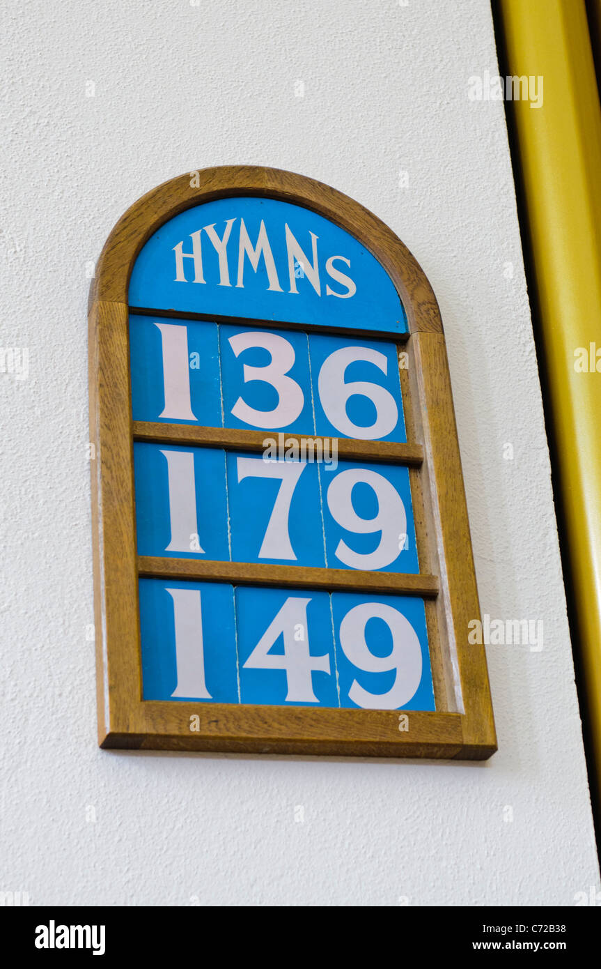 Hymn board in a church Stock Photo