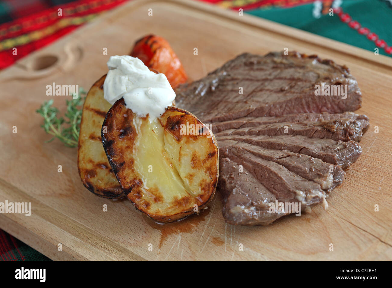 flank steak with baked potato Stock Photo