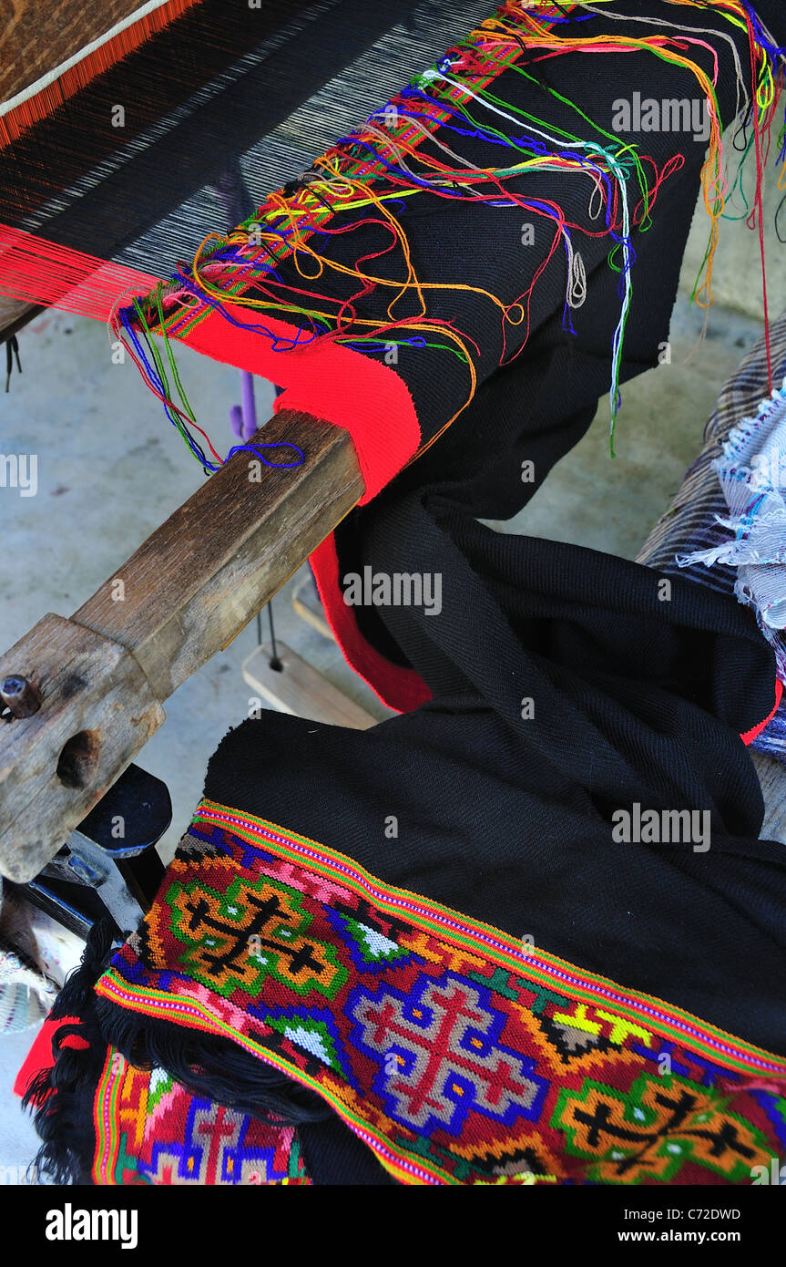 There are many woman making traditional beautiful tapestry in the garden Stock Photo Alamy