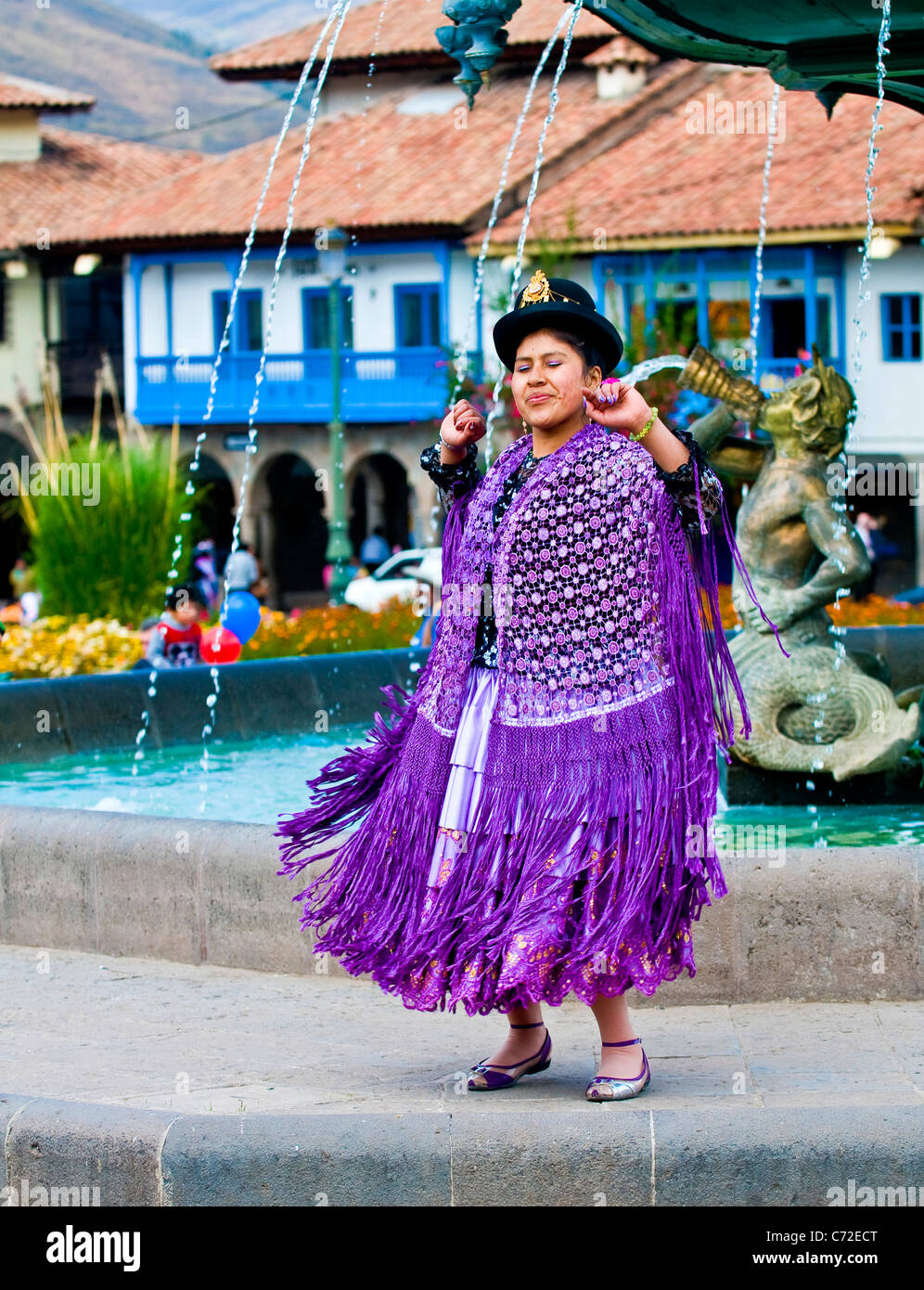 Peruvian dancer with traditional clothes dancing in street in Cusco Peru Stock Photo