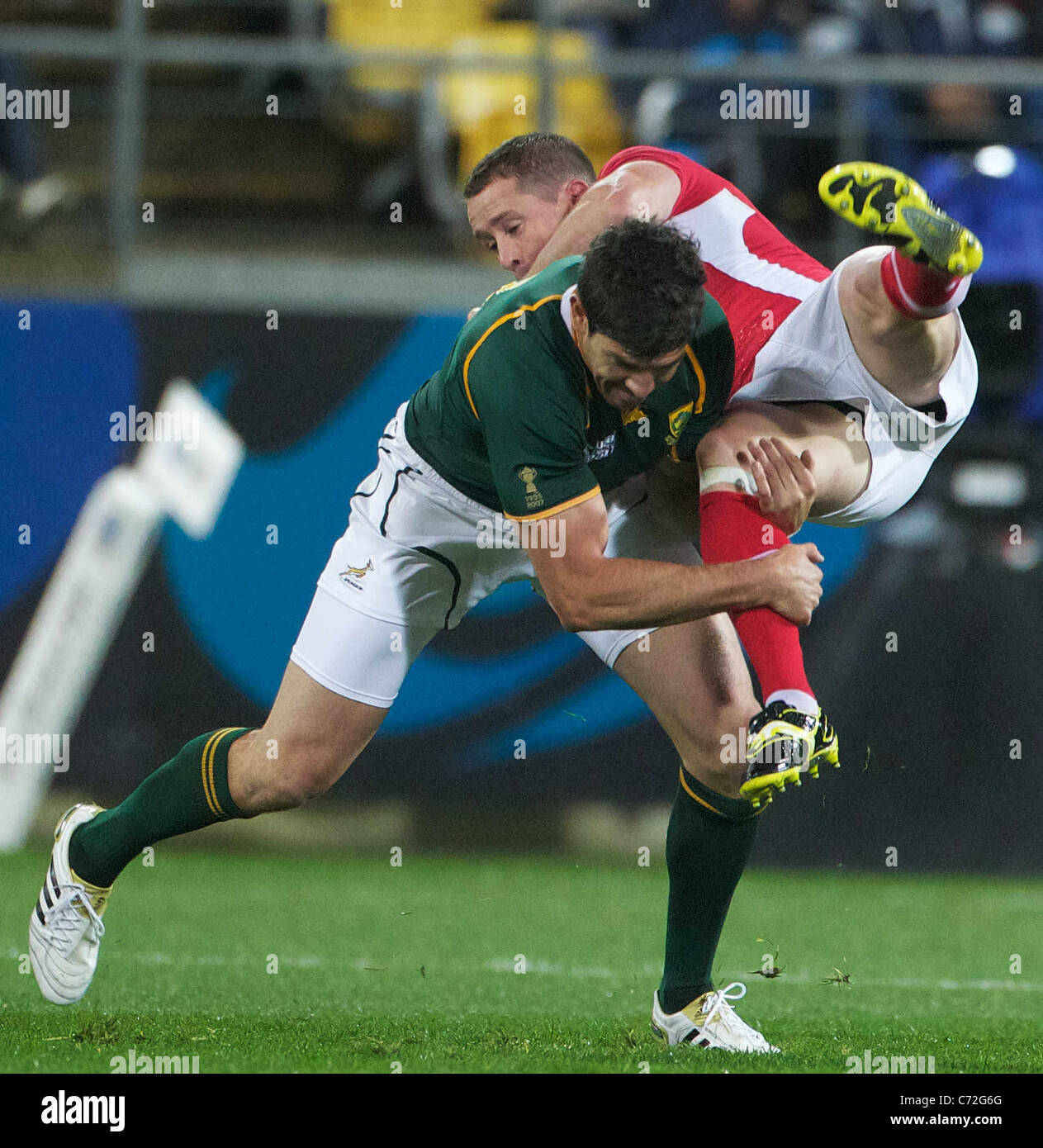 Huw Bennett, Wales, is tackled by Jaque Fourie, South Africa, (left) during the Wales V South Africa, Pool D match Stock Photo