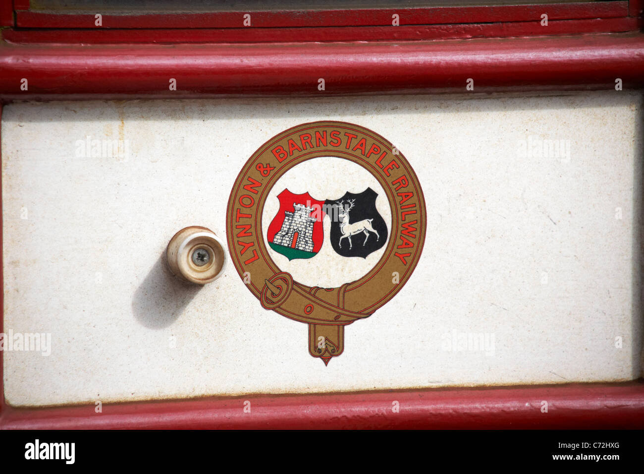 Lynton & Barnstaple Railway logo on side of engine at Woody Bay Station in August Stock Photo