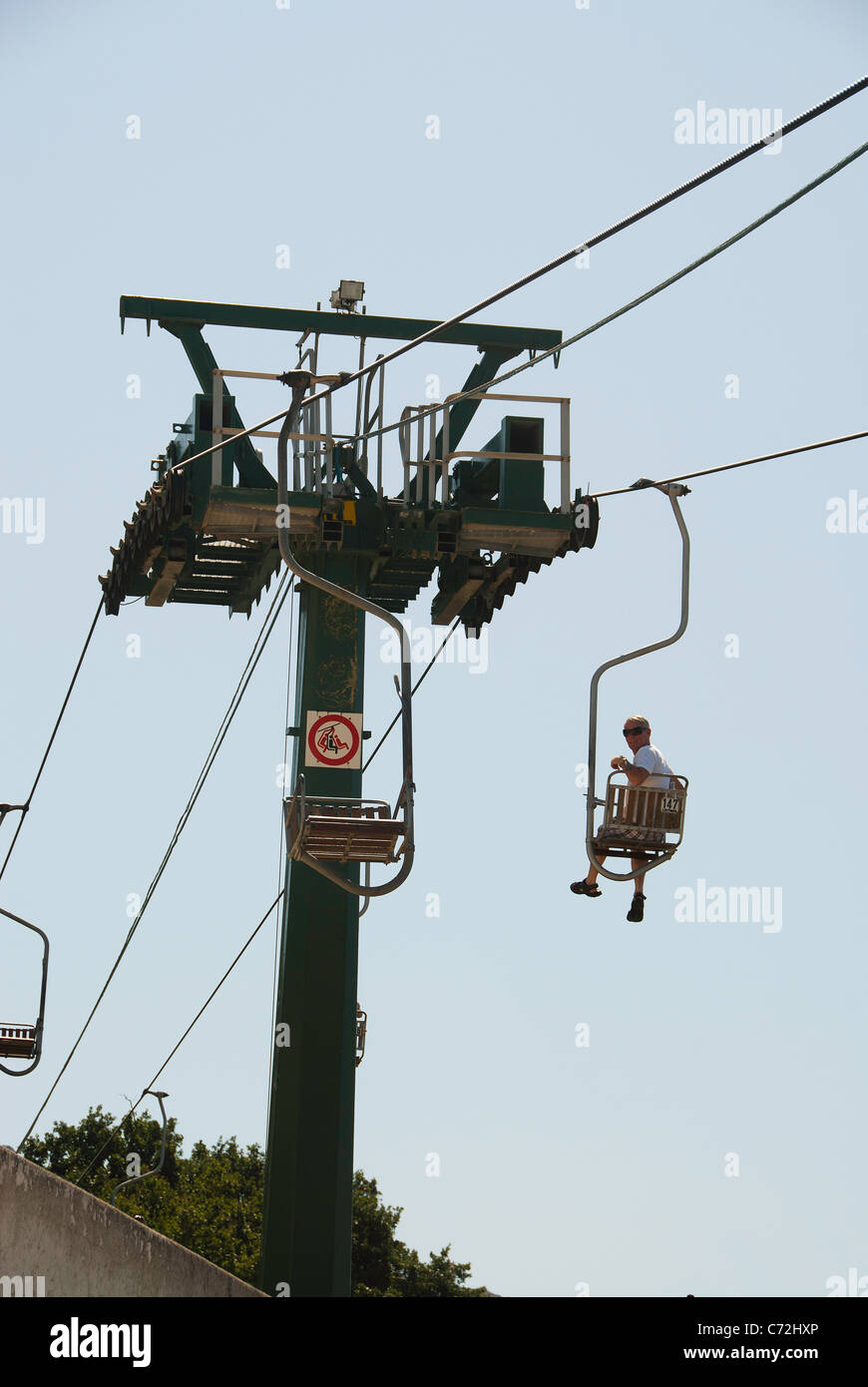 Passenger on the Capri chair lift Stock Photo Alamy