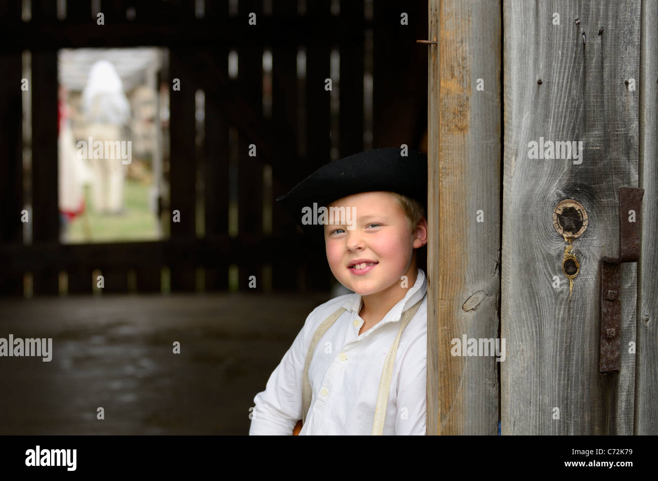 Young boy in period costume in a barn at a US civil war re-enactment Country Heritage Park Milton Ontario Stock Photo