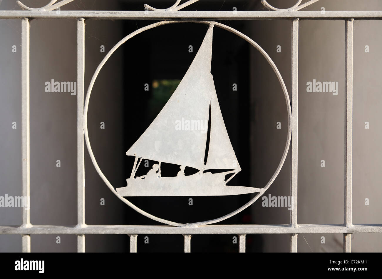 Steel gate with sailing yacht motif Lower Largo East  Fife Scotland UK Stock Photo