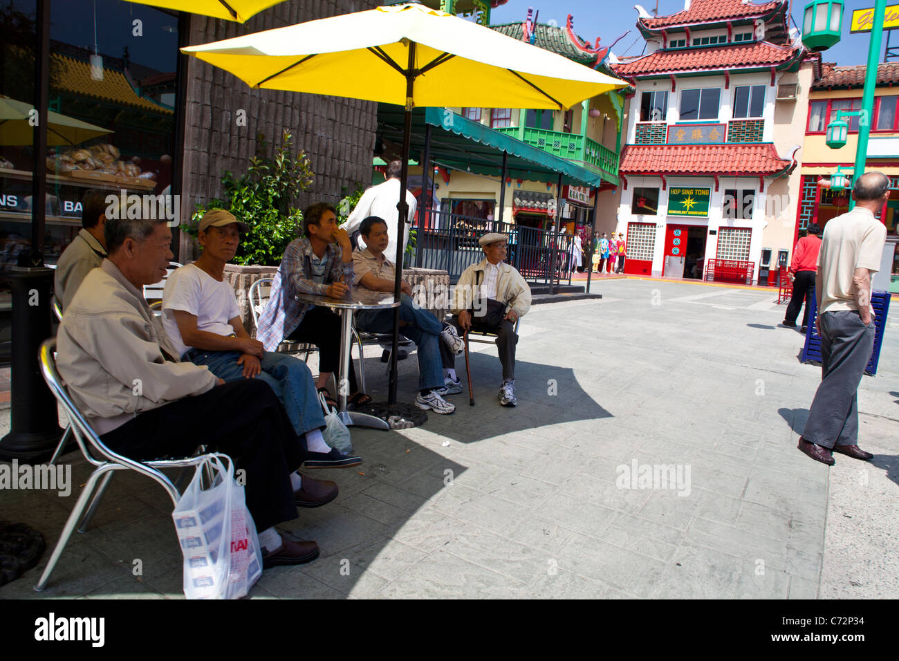 Retirees hanging out in Chinatown Los Angeles California Stock Photo