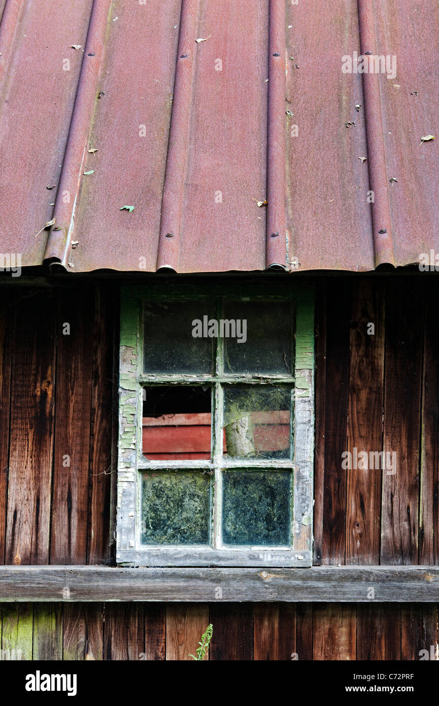 Old disused neglected Farm building in English countryside Stock Photo