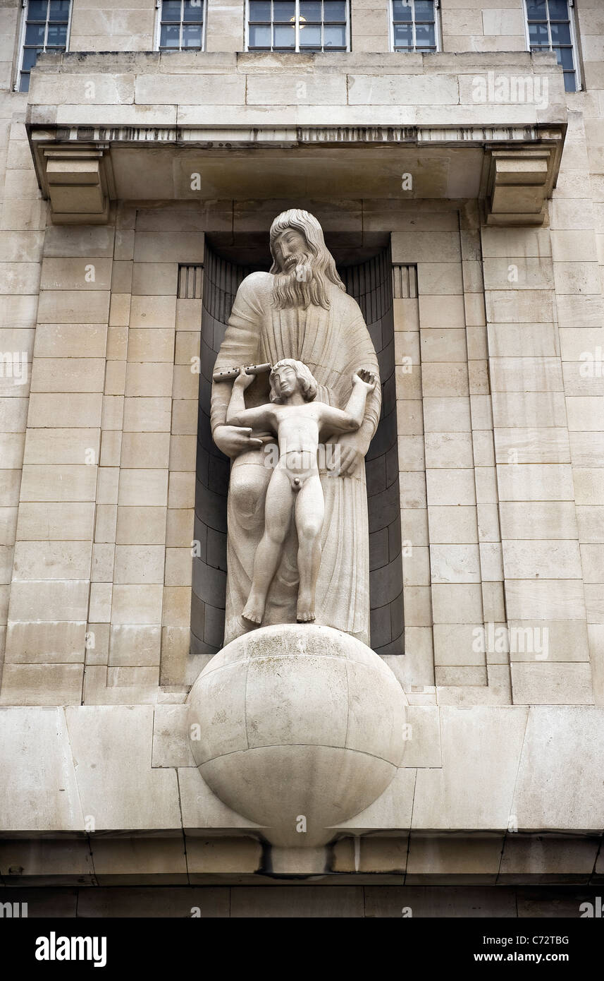 Eric Gill sculptures of Prospero and Ariel on the facade of BBC Broadcasting House, Portland Place, London, UK Stock Photo