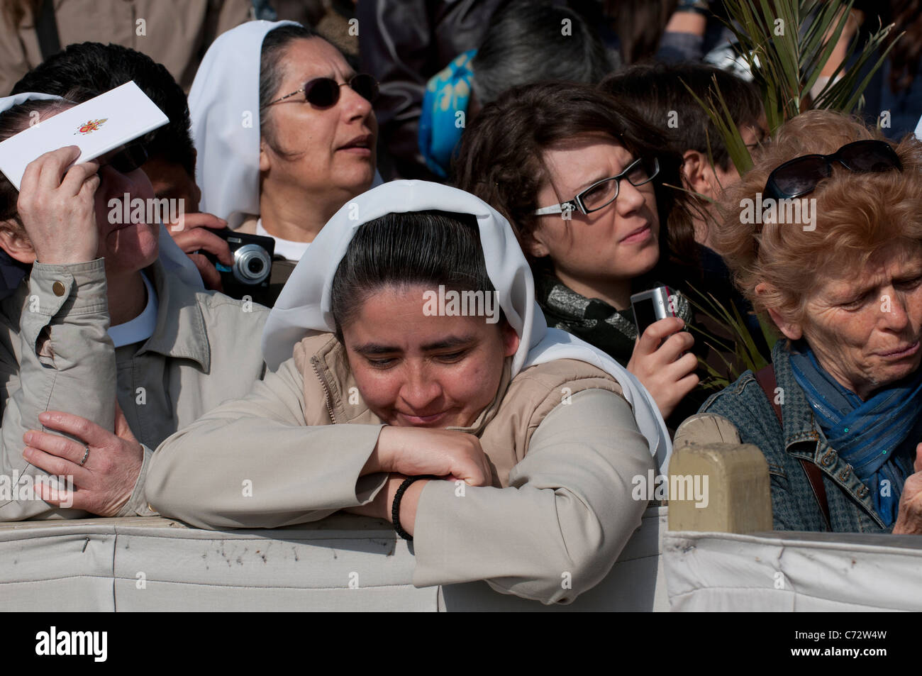 South American nuns waiting in the crowd for the Pope's procession, Saint Peter's Square, Palm Sunday 2011 Vatican City Stock Photo