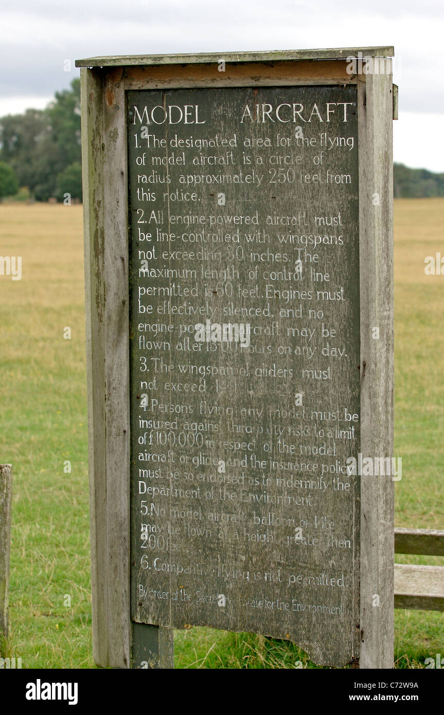 Old sign displaying the rules for flying model aircraft at the Richmond Park Flying Field in London Stock Photo