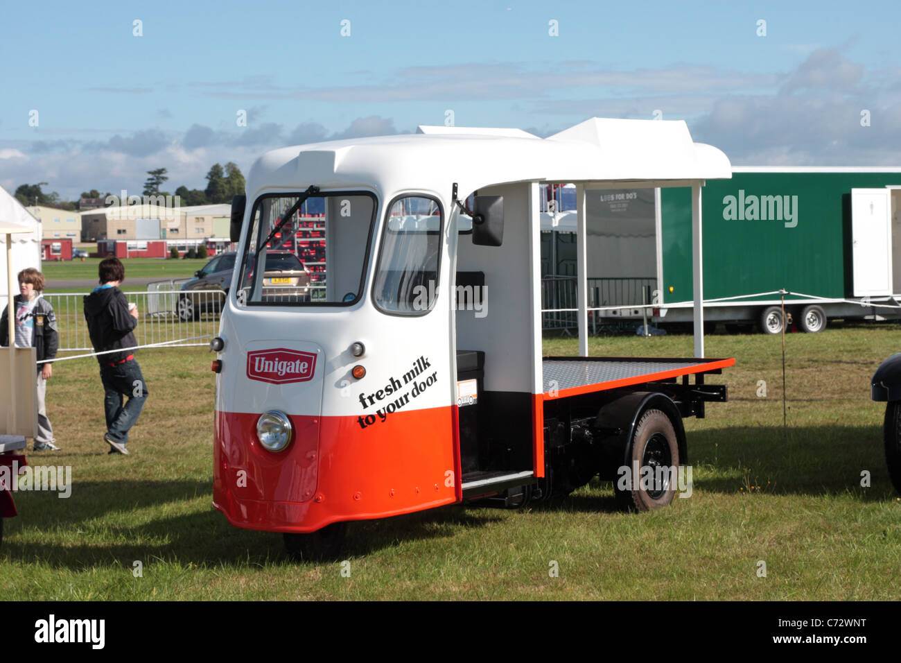 A restored Wales and Edwards Unigate Dairies Milk Float Stock Photo