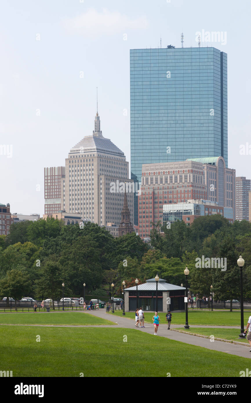 The John Hancock Building and part of the city skyline as viewed from the Boston Common in Boston, Massachusetts. Stock Photo