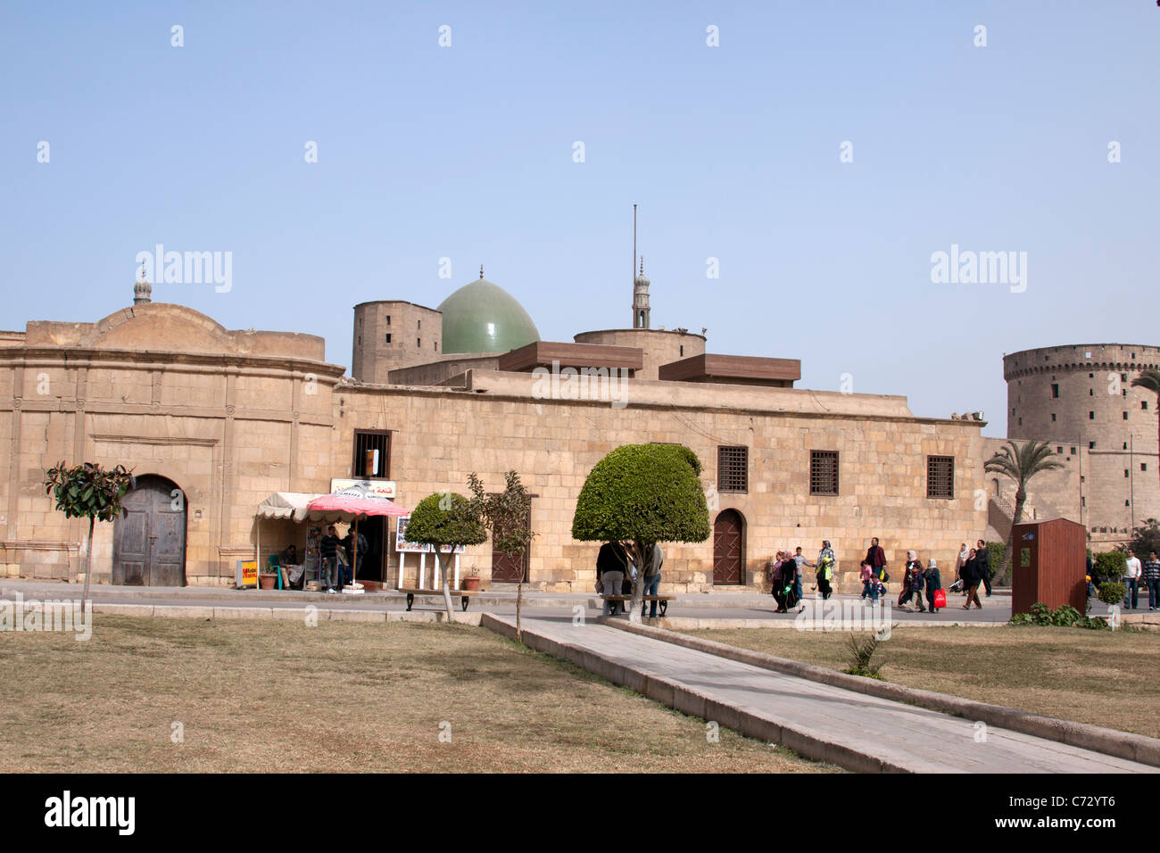 Buidings inside the Saladin Citadel in Cairo, with a museum and other buildings visible. The dome of a mosque also visible. Stock Photo