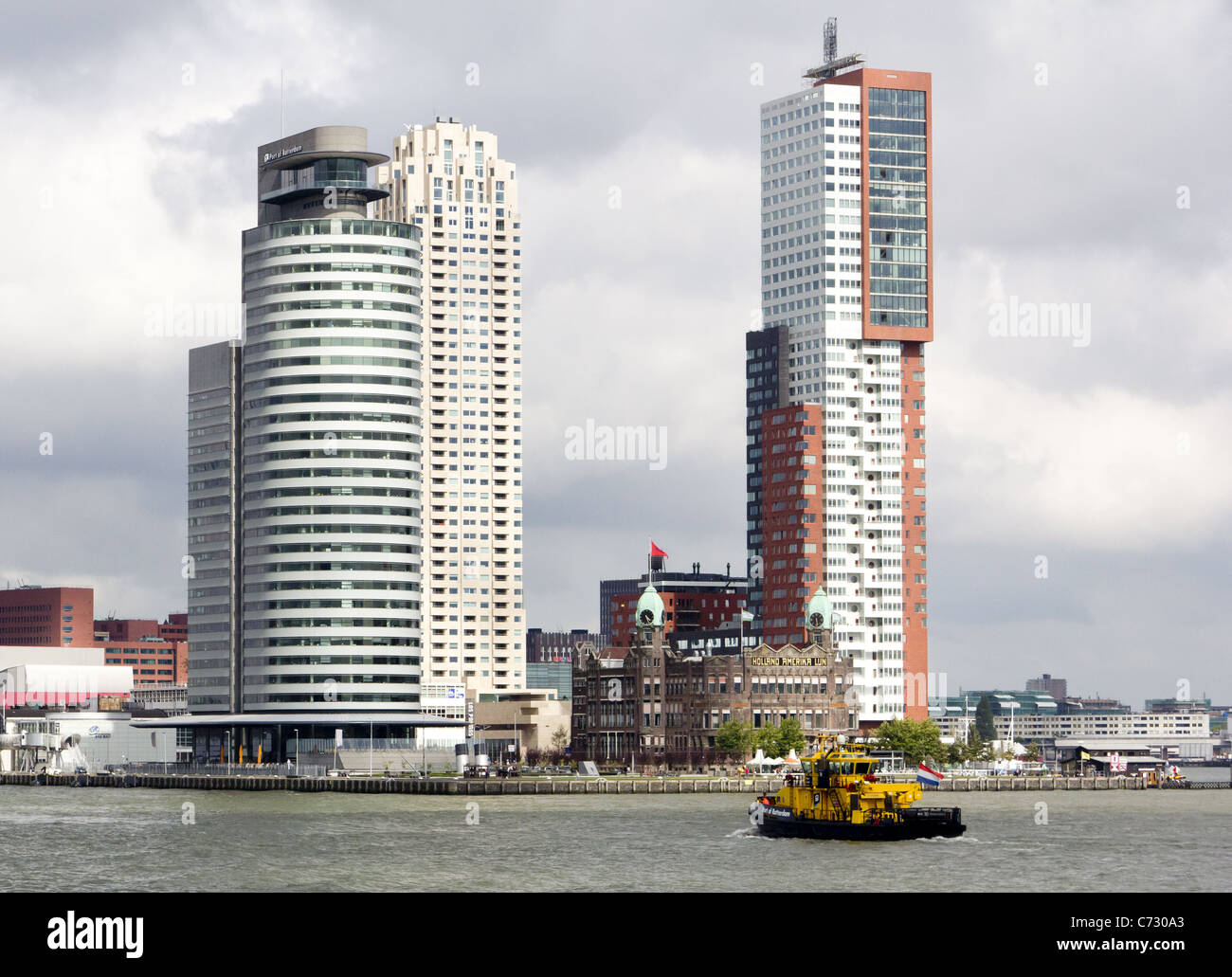 View across the Nieuwe Maas  to Kop van Zuid, the World Port Centre, Hotel New York and Montevideo tower Stock Photo