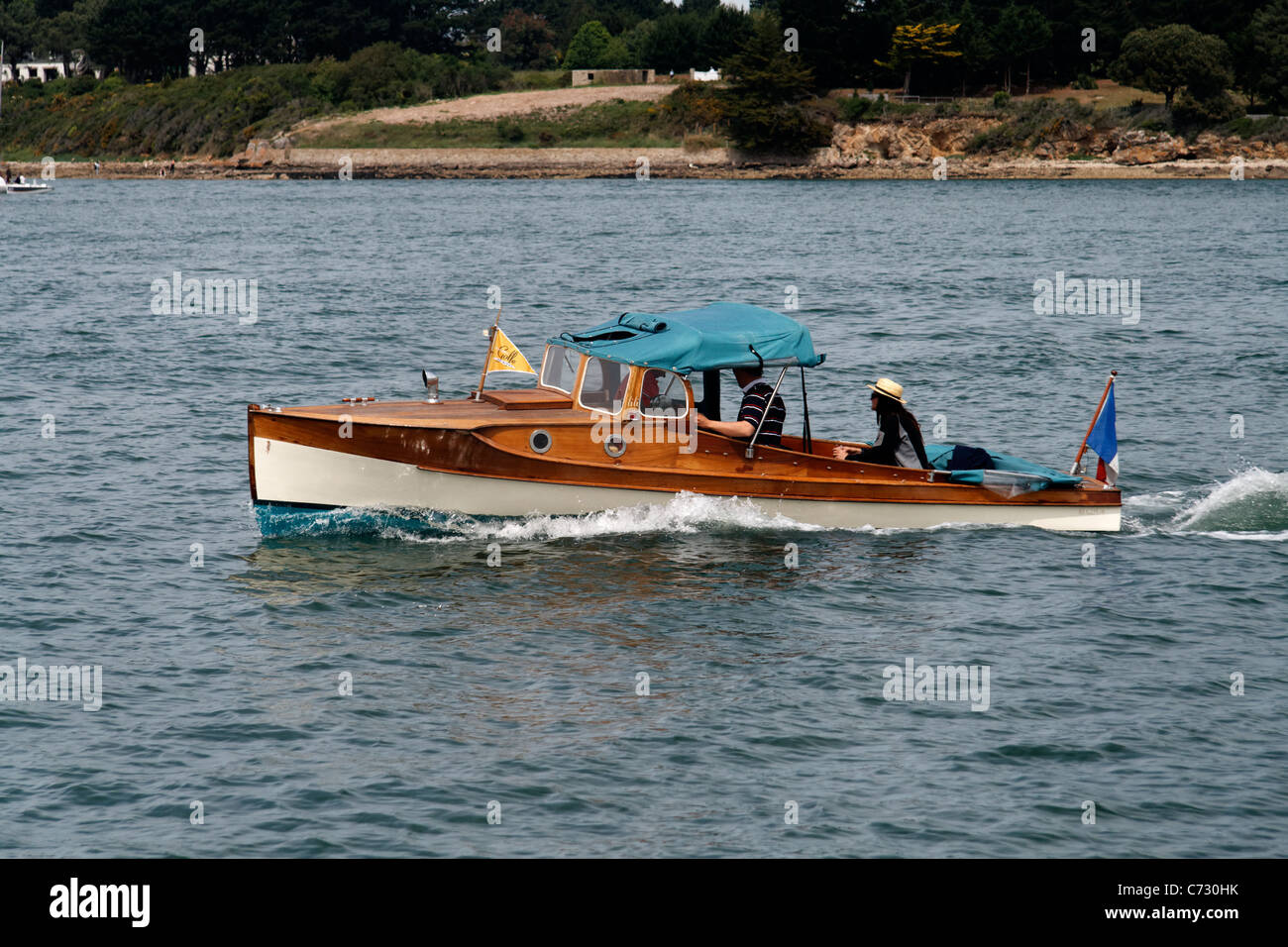 Wooden boat motoring,  Week of the Gulf of Morbihan (Brittany, France). Stock Photo