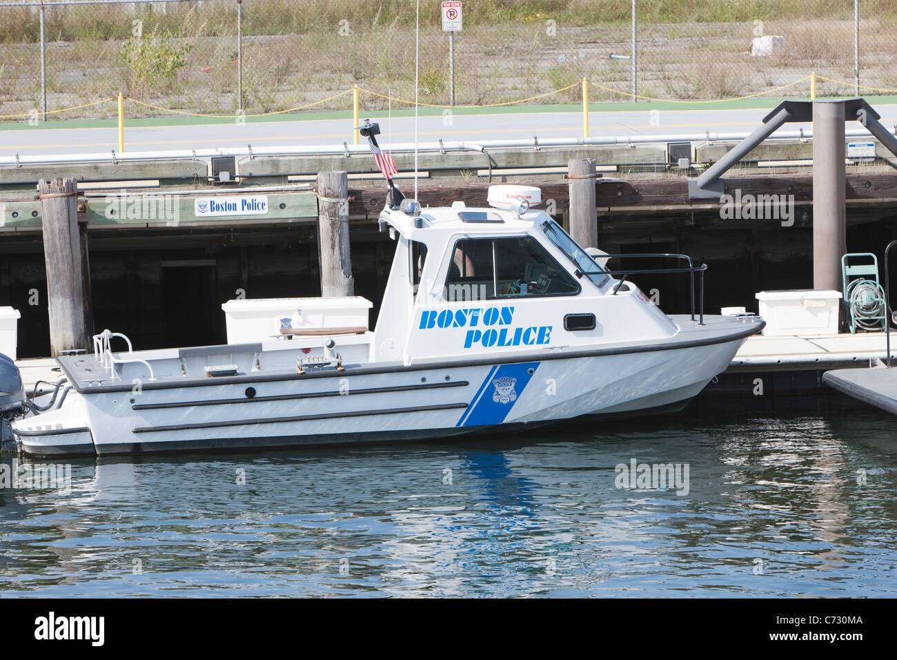 One of the boats of the Boston Police Harbor Patrol Unit, docked just off of Terminal Street in South Boston Stock Photo