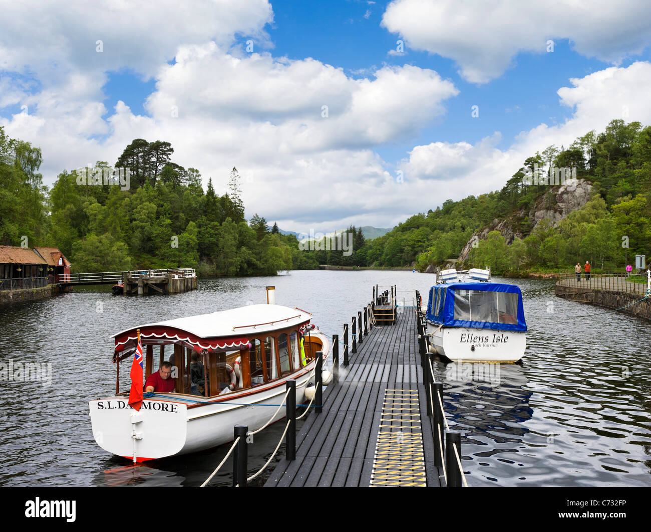 Excursion boats moored at Trossachs Pier on Loch Katrine in the Trossachs National Park, Stirling, Scotland, UK Stock Photo
