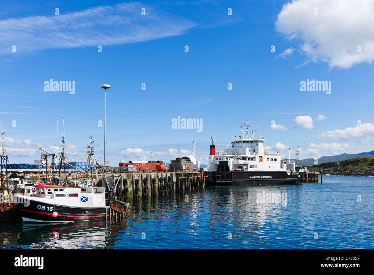 Harbour at Mallaig with the Caledonian MacBrayne ferry at the end of the jetty, Lochabar, Highland, Scotland, UK Stock Photo