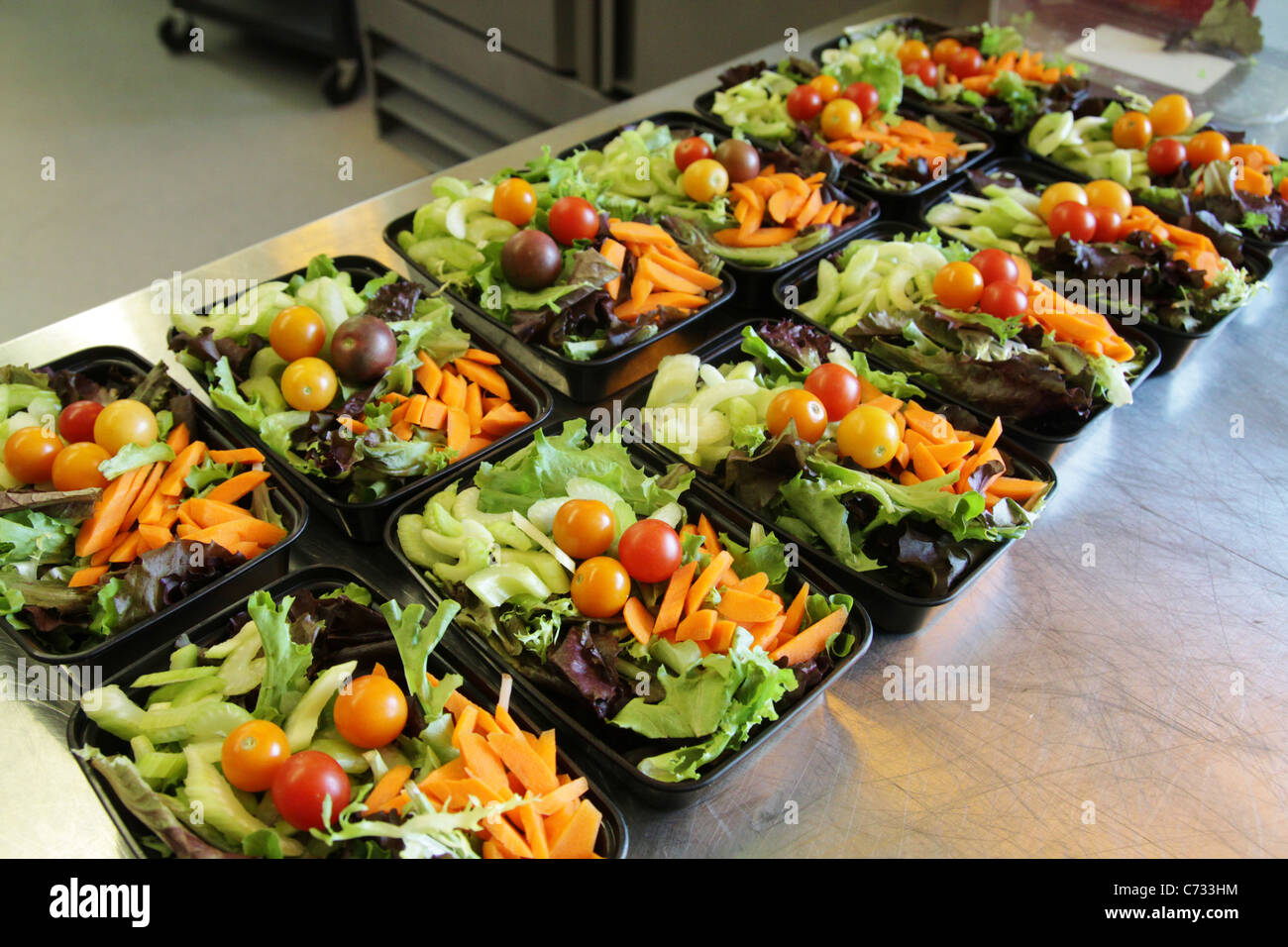 Prepared, single serving fresh salads. Stock Photo