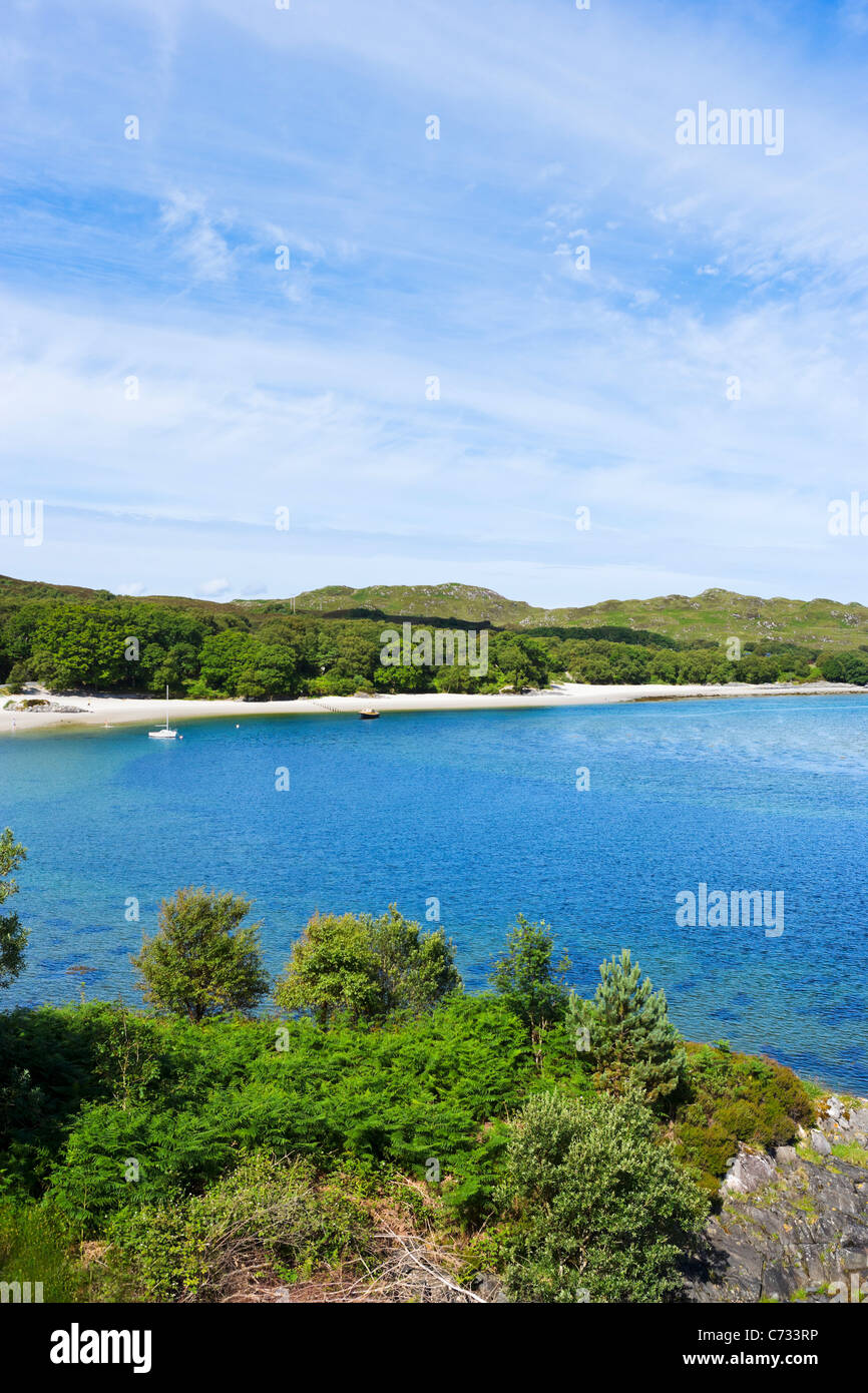 Beach viewed from the bridge over the River Morar on the A830 'Road to the Isles' near to Mallaig, Scottish Highlands, Scotland Stock Photo