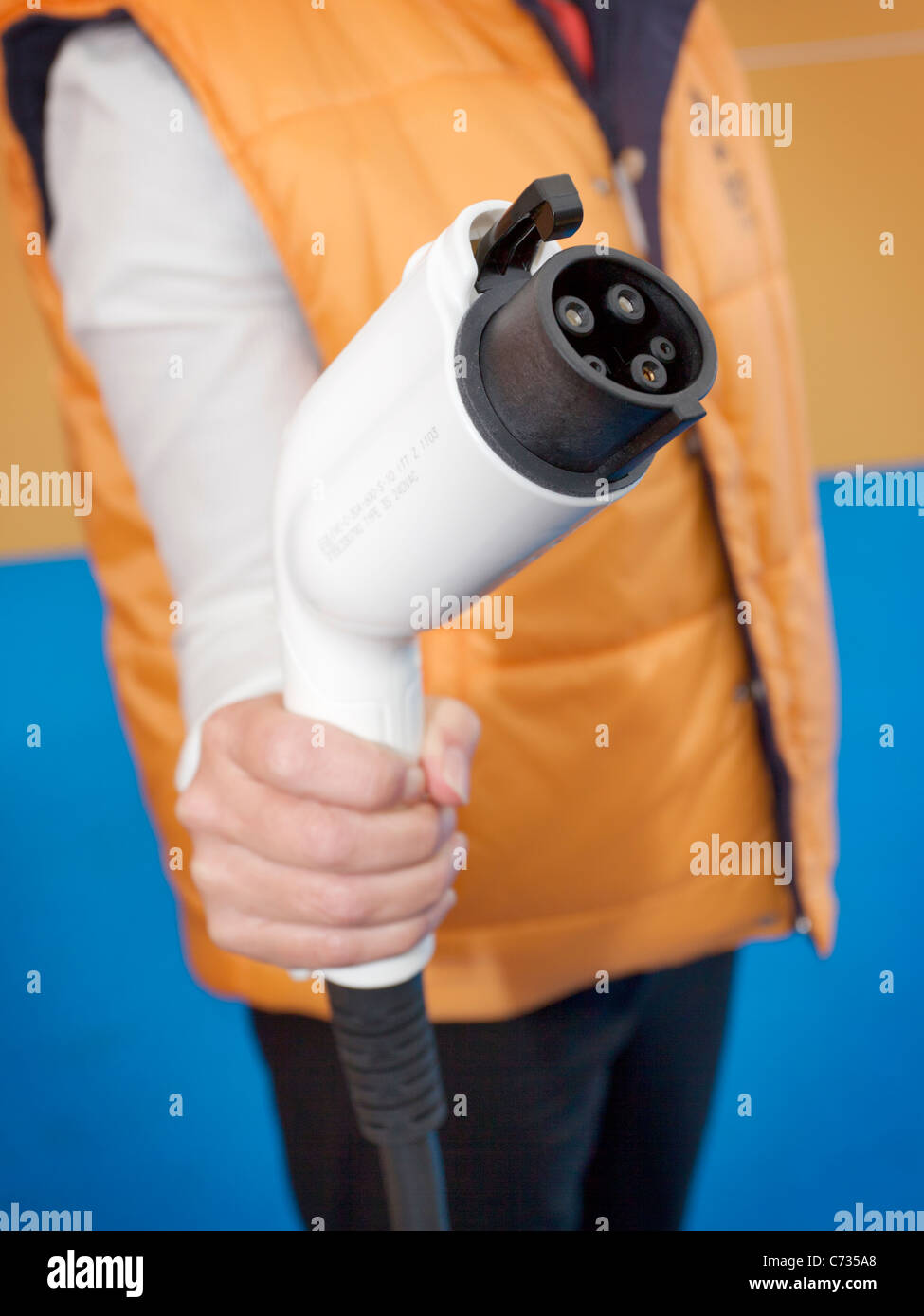 Electric Car charging plug Stock Photo