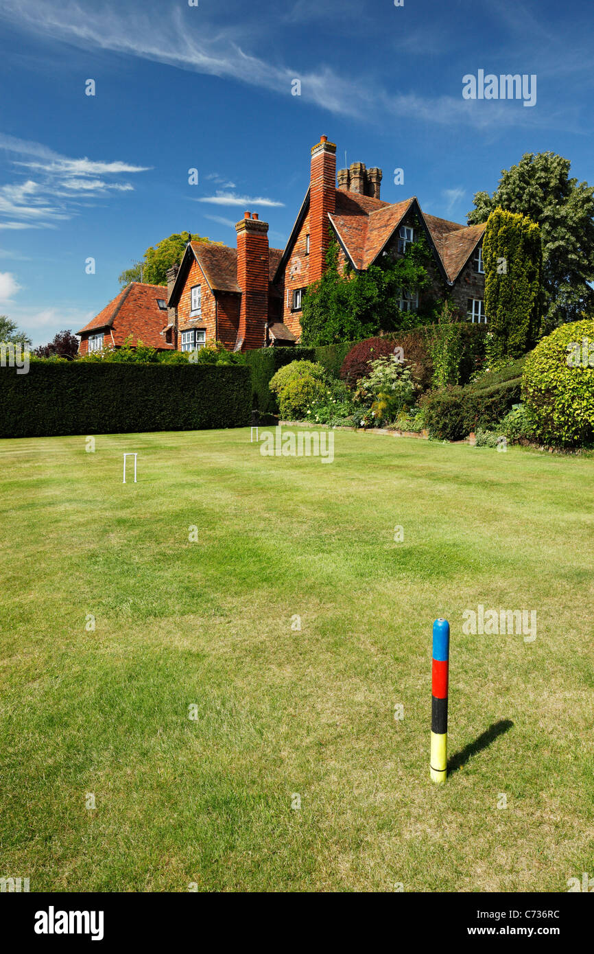 Croquet lawn in the gardens of a large country house Kent. Stock Photo
