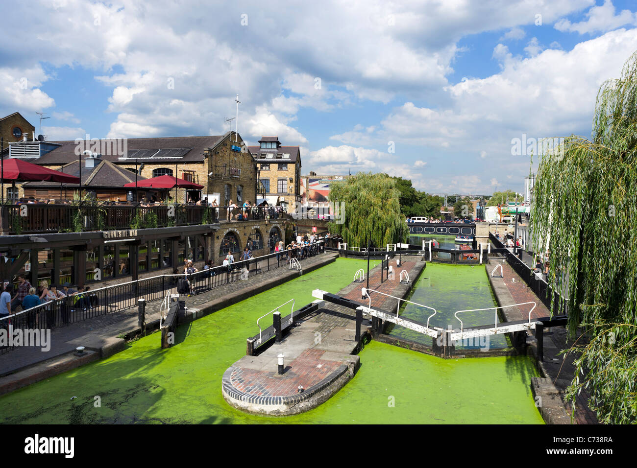 Canalside Bar and Camden Lock on the Regent's Canal in August 2011 when it was infested with green duckweed, North London, UK Stock Photo