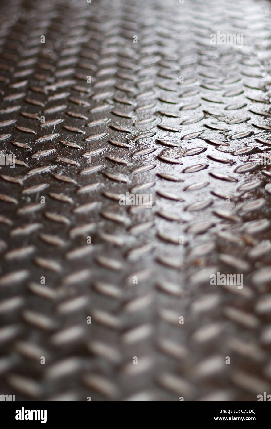 Closeup of real diamond plate material - super shallow depth of field. Stock Photo