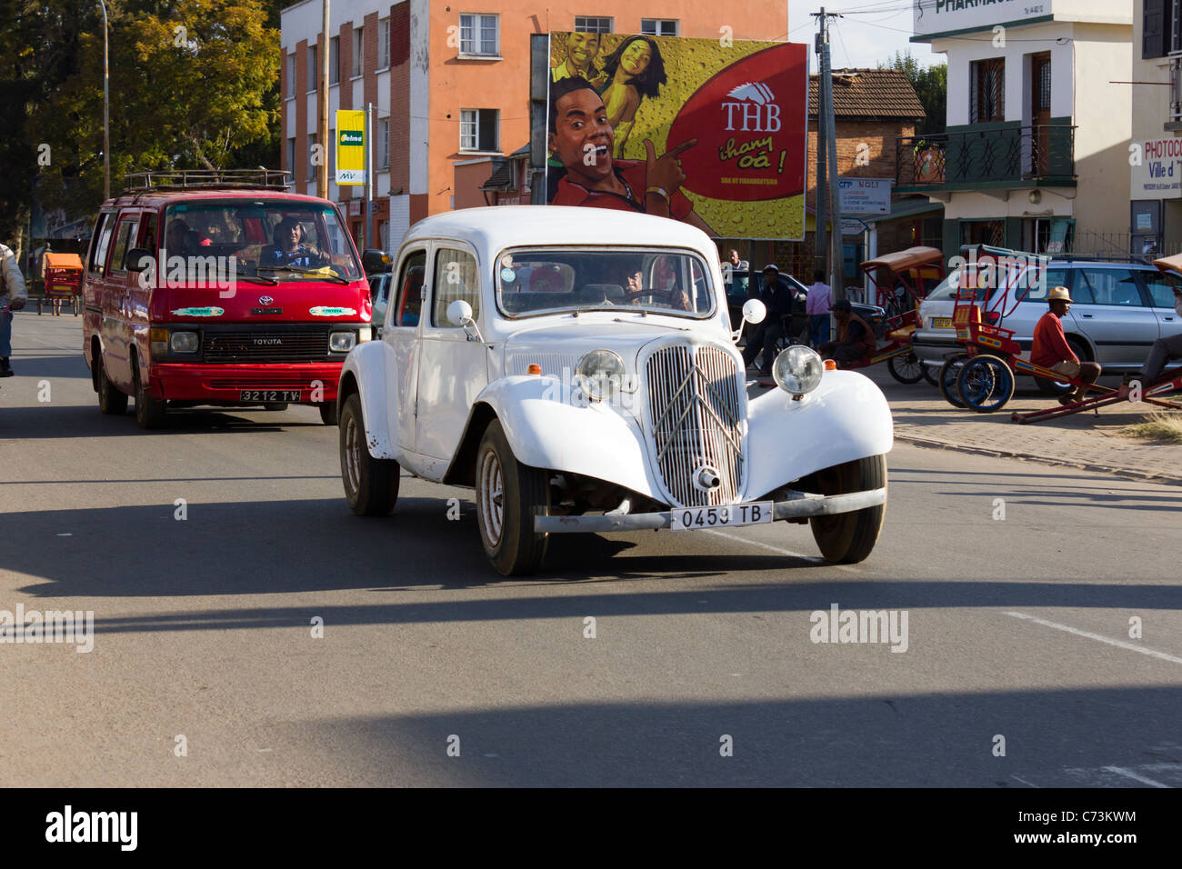street in Antsirabe, Madagascar, with Citroën Traction Avant Stock Photo